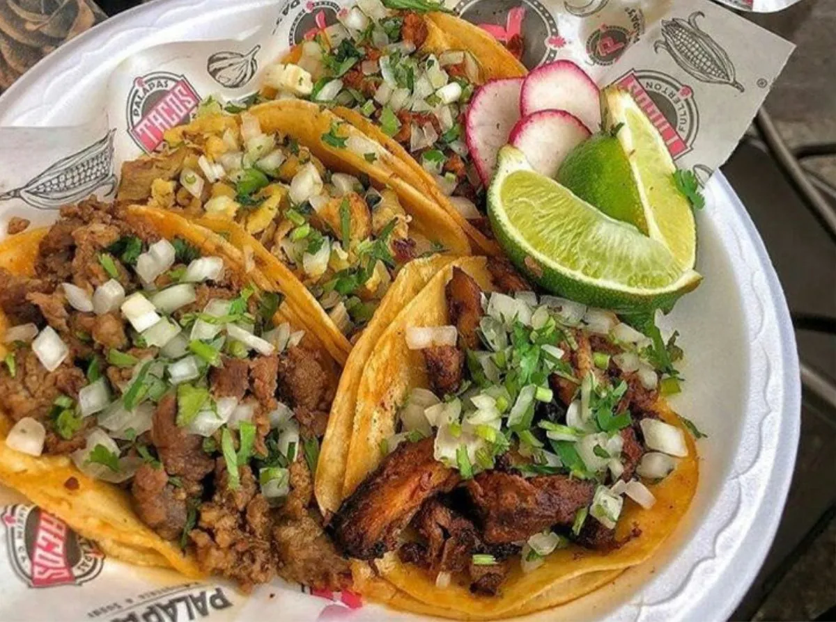 Street tacos with onion, cilantro and lime